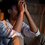 Mental health insurance claims - young woman stressed