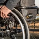 Colorado health insurance continues to protect those with pre-existing conditions - man in wheelchair