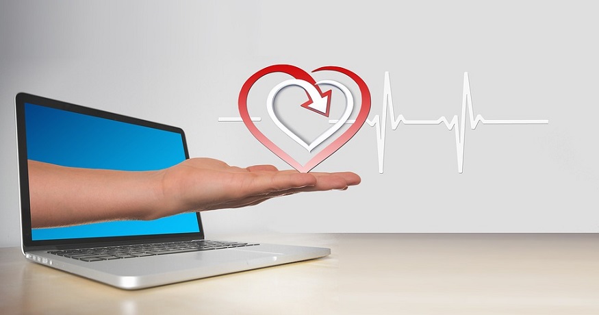 Health insurance exchange - Computer - heart - hand - heartbeat