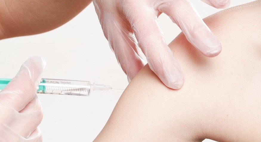 Back to school vaccines - person receiving vaccine - needle