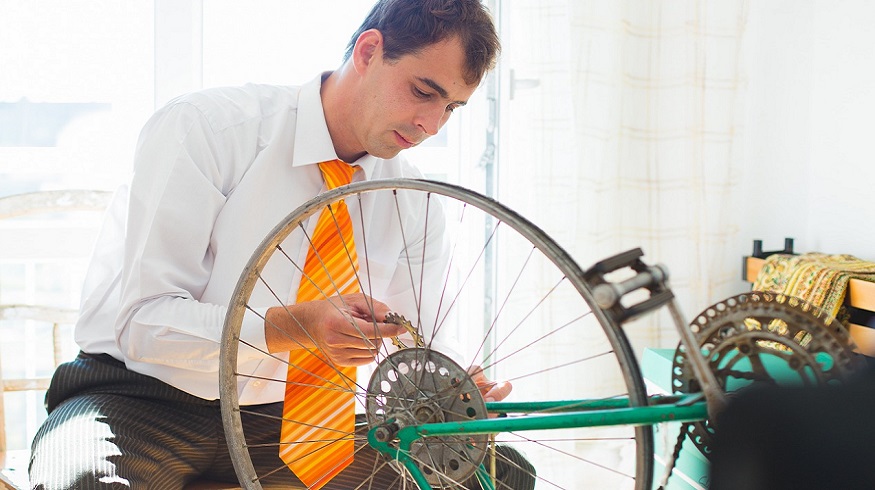 Bicycle Repair Business Insurance - Man repairing bike