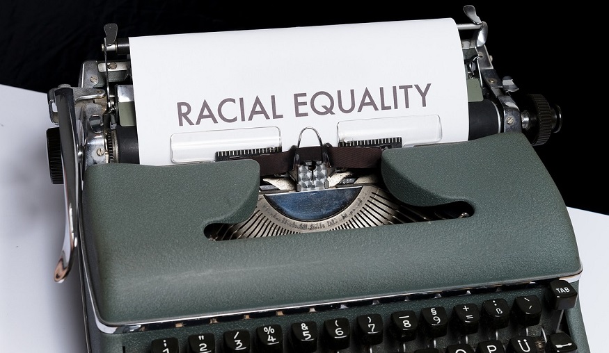 Insurance industry racism - racial equality - typewriter