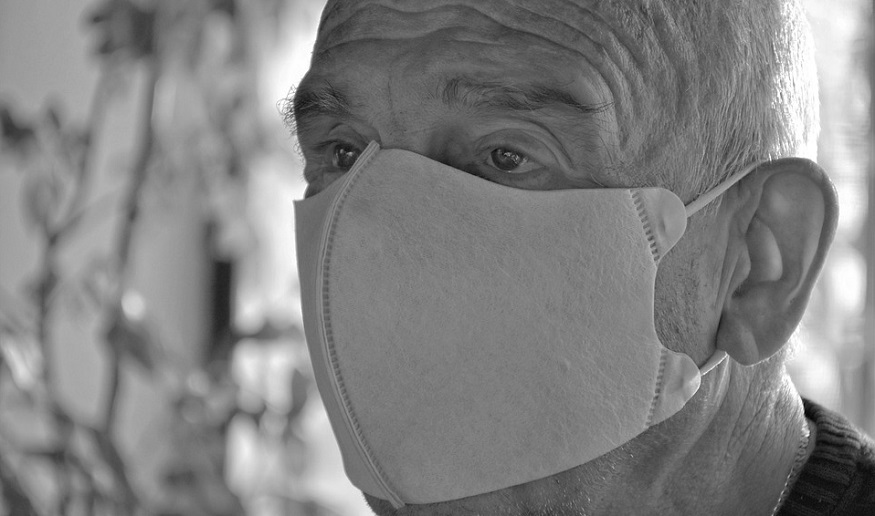 Life insurance coverage - COVID-19 - senior wearing mask