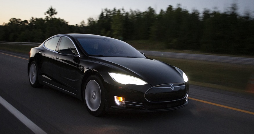 Tesla car insurance - Tesla vehicle on road
