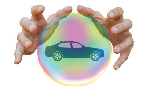 Auto insurance companies - hands - car in bubble