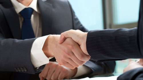 AIG Insurance - Business deal -handshake