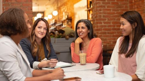 Employment practices liability insurance - women sitting around a table