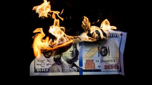 Insurance company - money on fire - financial loss