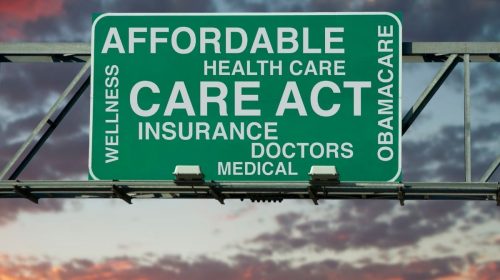 Health insurance - ACA - Road Sign