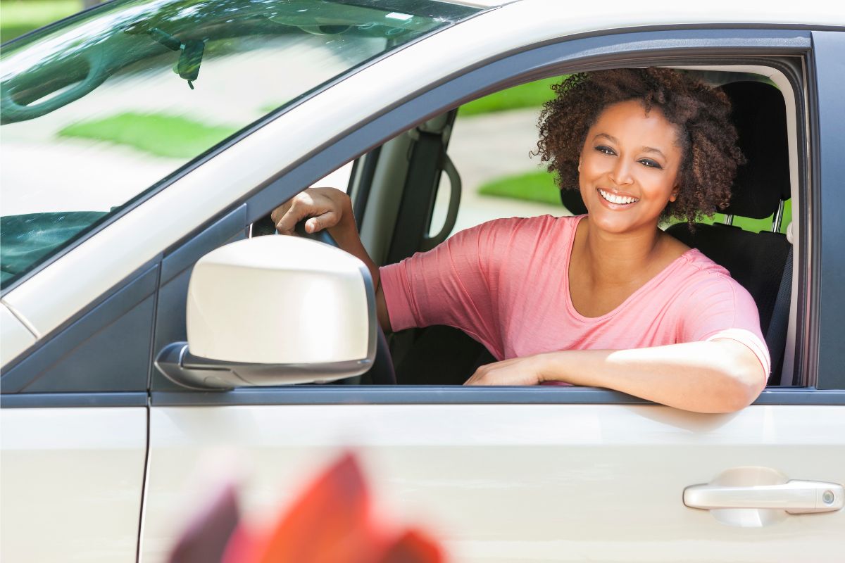 auto insurance - woman driving vehicle