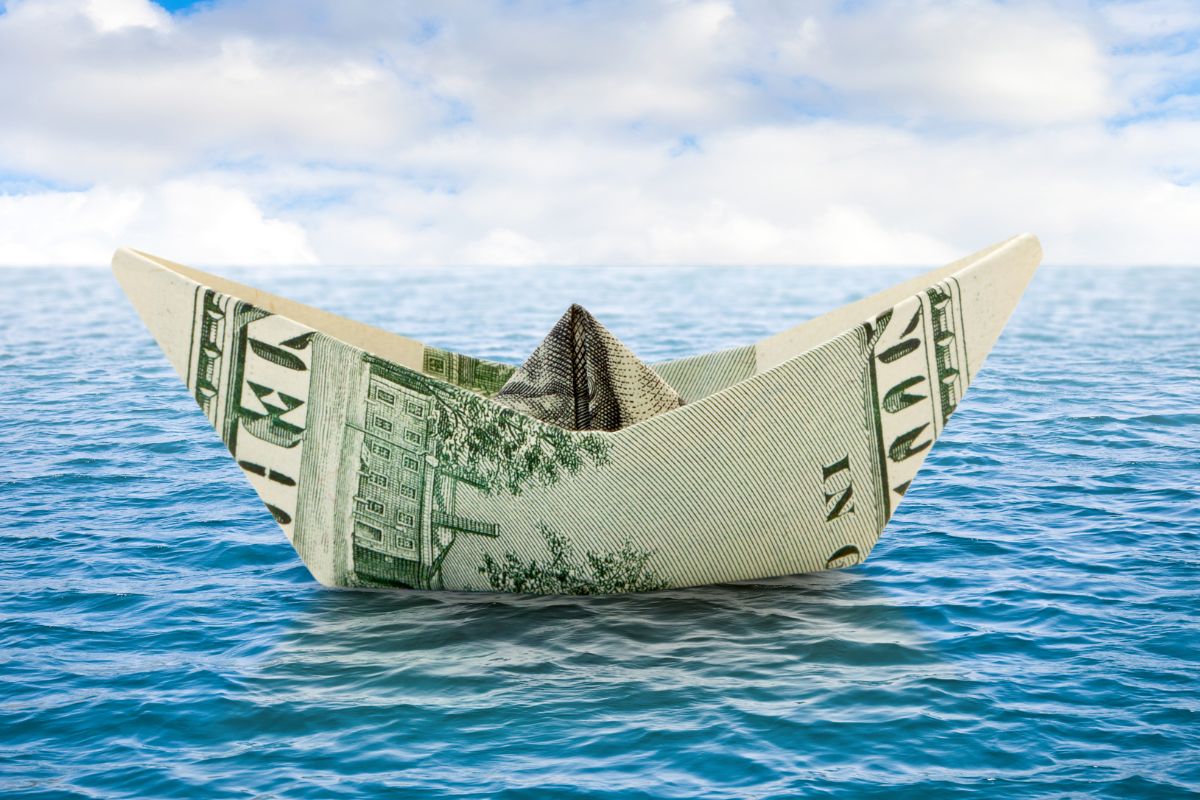 Flood insurance - Money Boat on Water