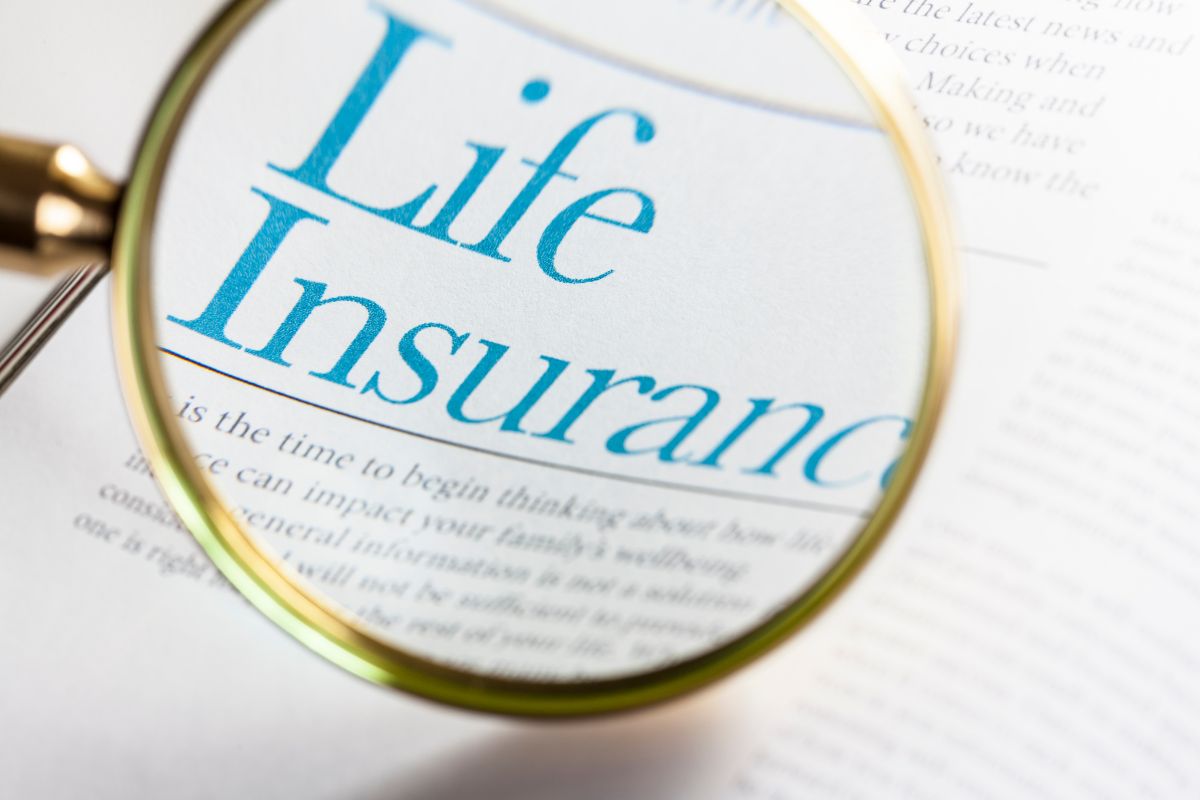 Life insurance benefits - magnifying glass
