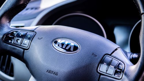 Auto Insurance - Kia steering wheel