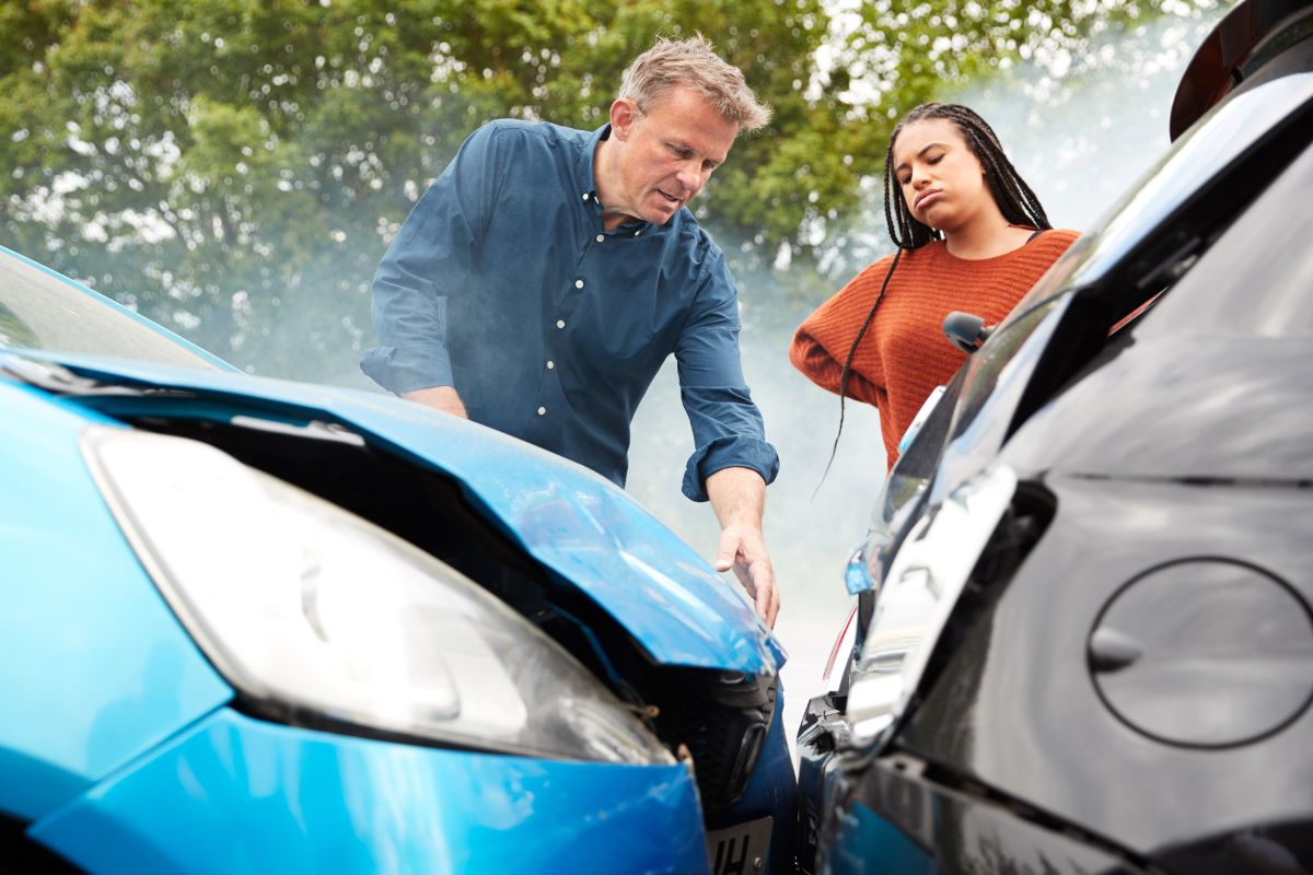 No-fault auto insurance - People after car crash