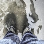 Flood Insurance Changes - Boots underwater