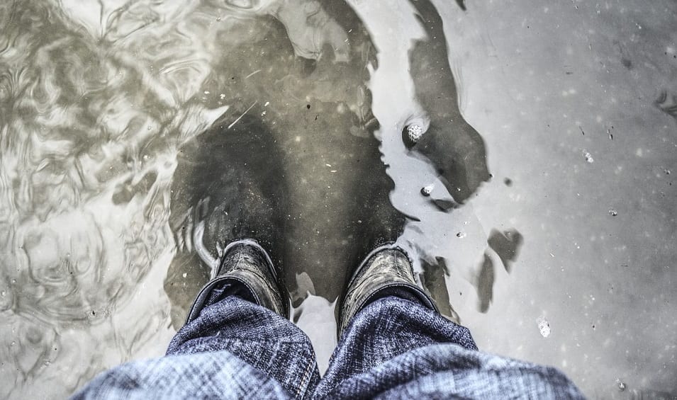 Flood Insurance Changes - Boots underwater
