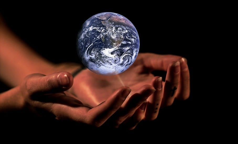 Climate Change effects - Hands - globe - world