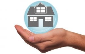 Homeowners insurance companies - Home in bubble over hand