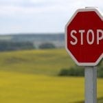 Repayment of insurance customers stopped - Stop Sign