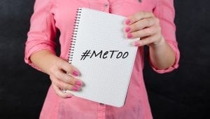Directors and Officers insurance - Woman Holding #MeToo paper