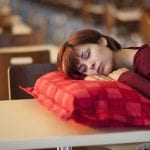 Daylight Saving Time - woman sleeping on table