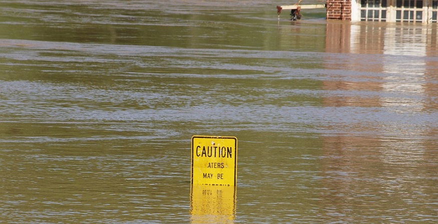 Buy Flood Insurance - Flood Waters - Caution sign