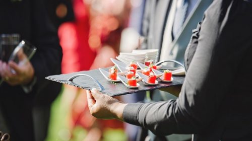 Catering Business Insurance - person serving food