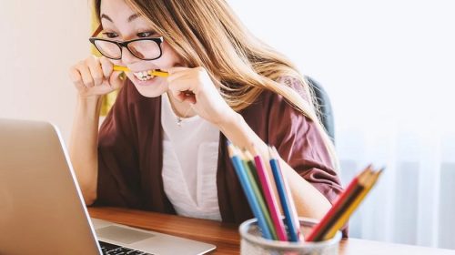 Students on Medicaid - Student stressed looking at laptop