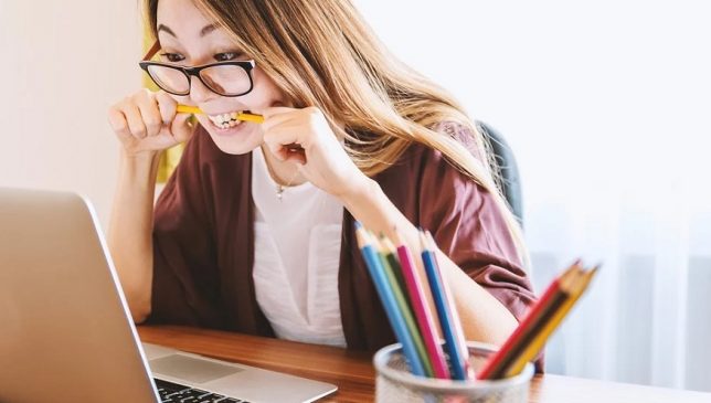 Students on Medicaid - Student stressed looking at laptop