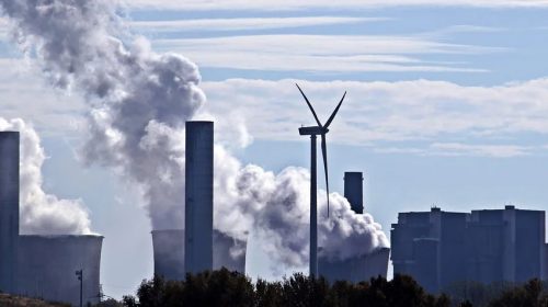 US Insurance Industry - Power plant and wind turbine