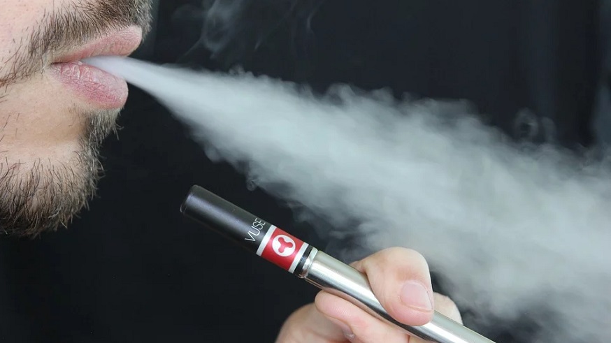 Vaping cessation - Person using E-cigarette - vaping