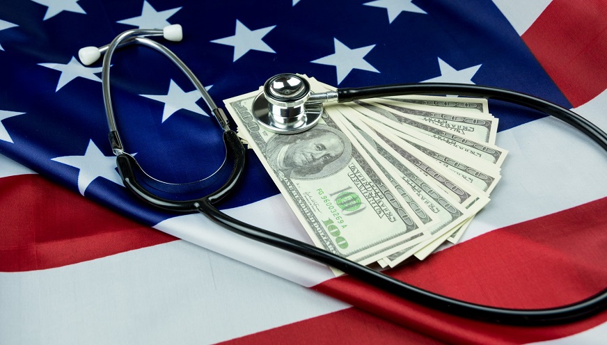 Massachusetts insurance enrollment - American Flag, money and stethoscope