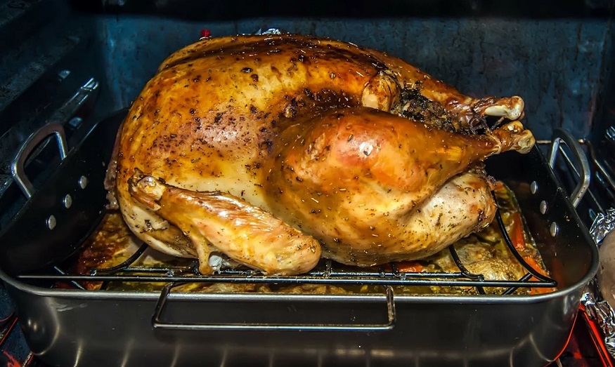 Thanksgiving Turkey Insurance - Turkey in oven