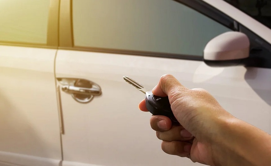 State Farm auto insurance rates - Person with car key