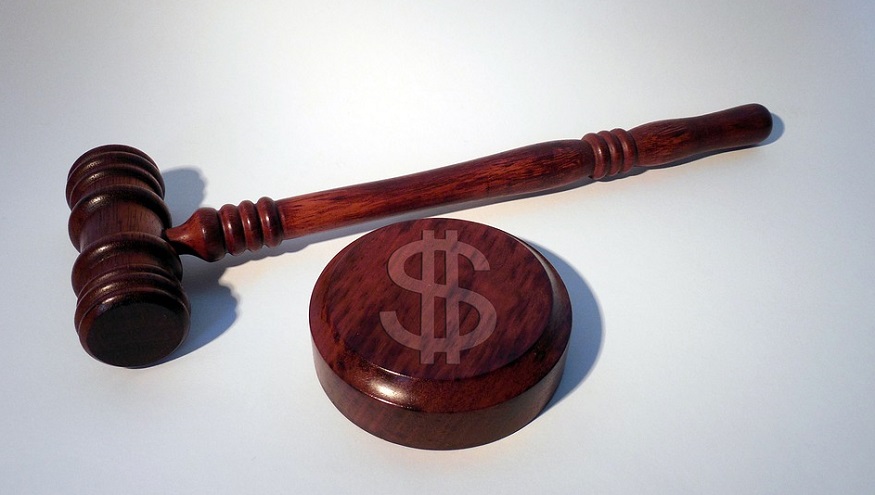 Underinsured driver benefits - gavel - dollar sign