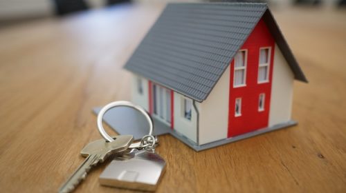 Homeowners Insurance Rates - House with keys