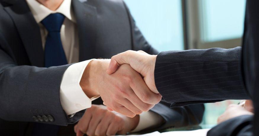 AIG Insurance - Business deal -handshake