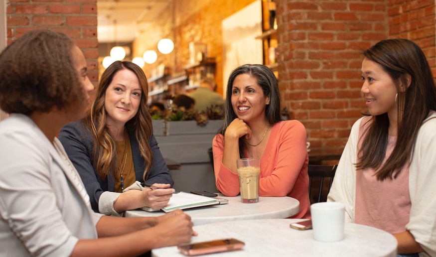 Employment practices liability insurance - women sitting around a table