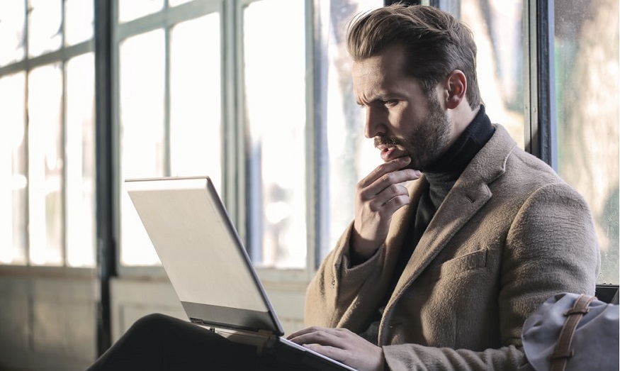 When Does Your Business Need Fiduciary Liability Insurance? 1 Fiduciary Liability Insurance - man looking at computer in thought