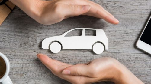 Commercial Auto Insurance - hands surrounding car