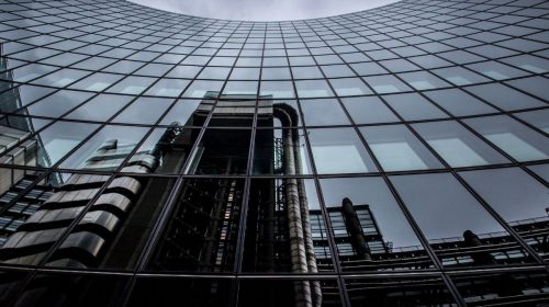 Insurance policies - Lloyd's of London Building reflected in glass