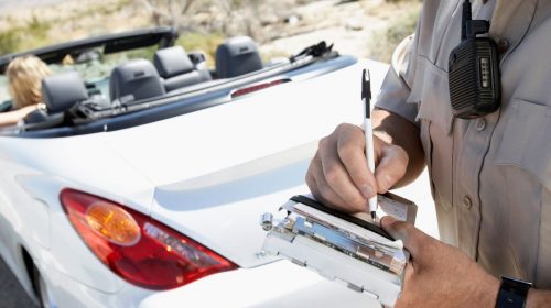 Speeding Tickets - Police giving ticket to driver