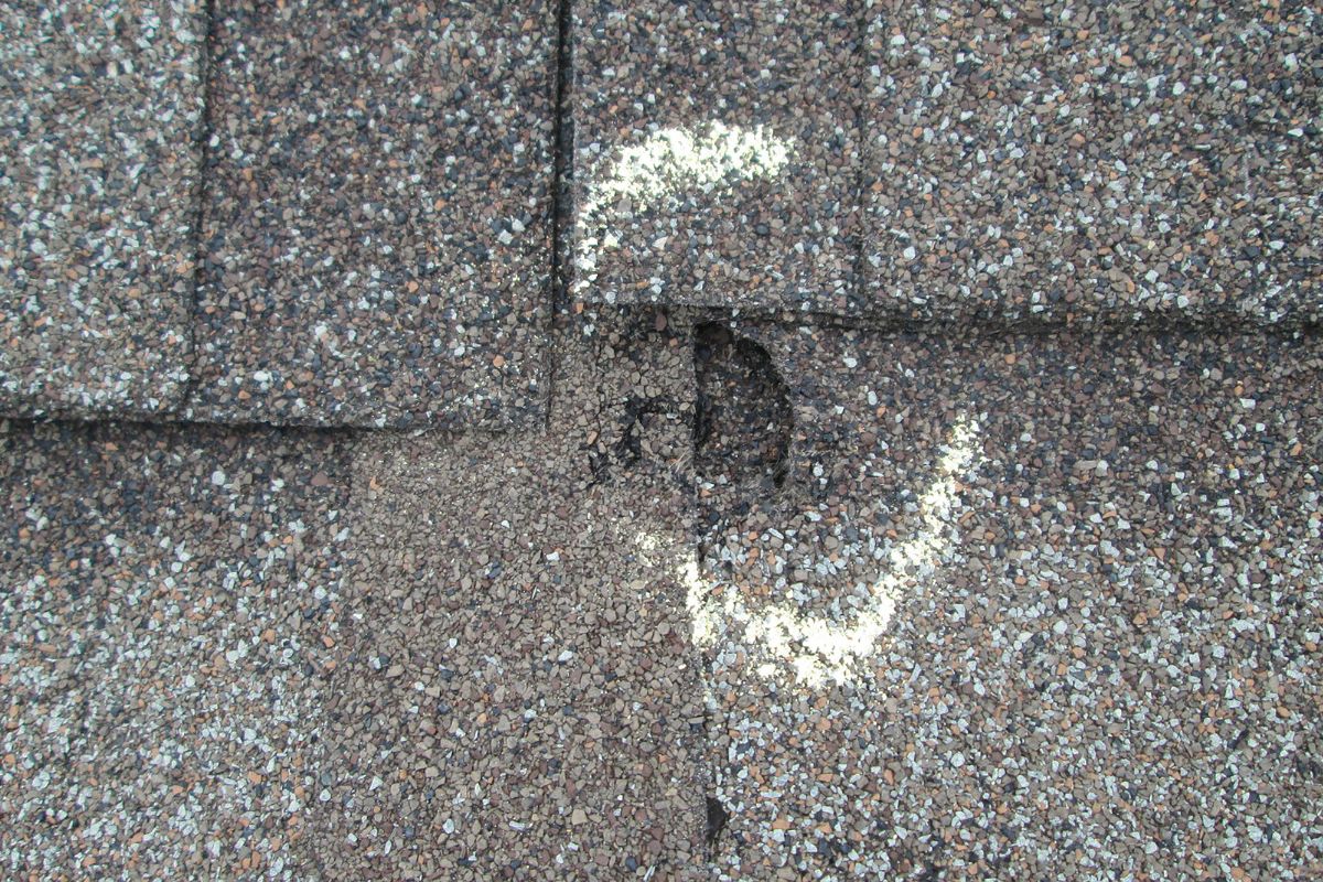 Hail insurance - Hail damage on house roof