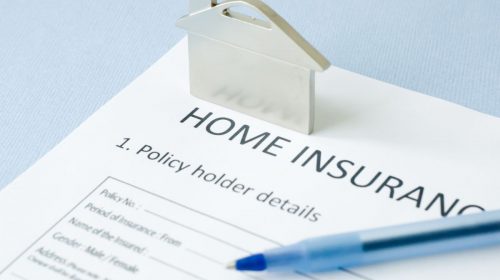 Home insurance - Form with a pen