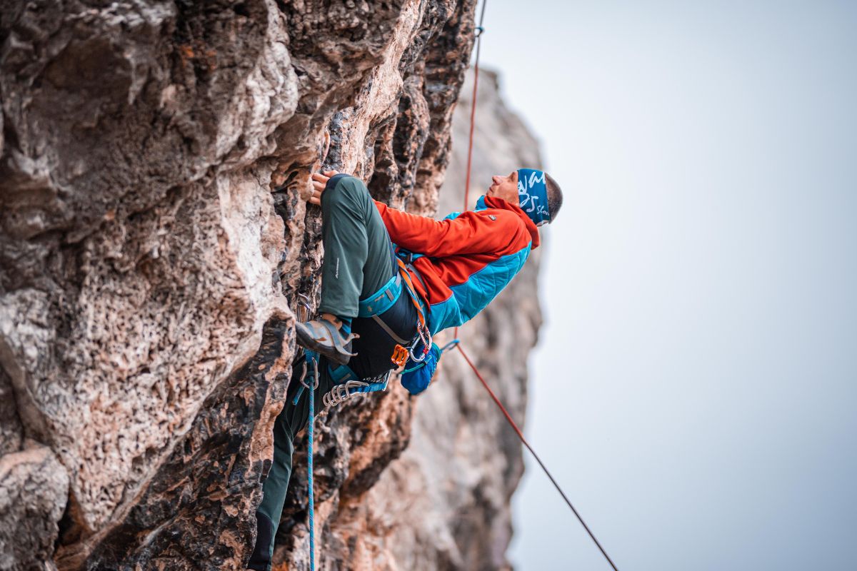 Extreme travel insurance - Person mountain climbing