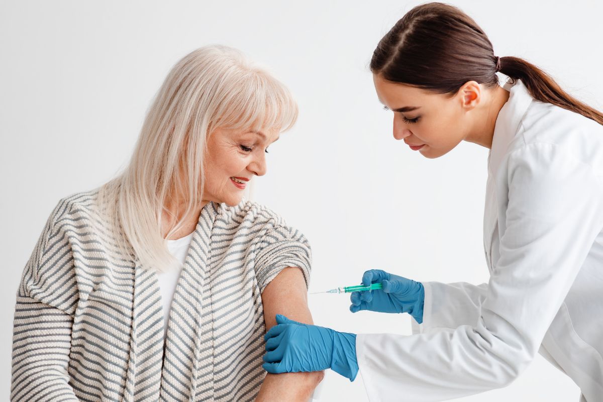 Health insurance - senior receiving vaccine
