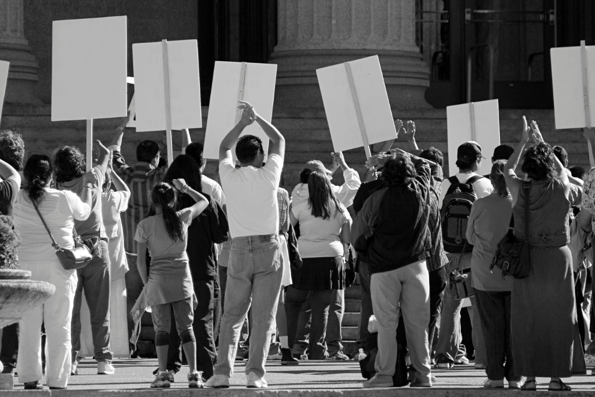 Home insurance - People Protesting