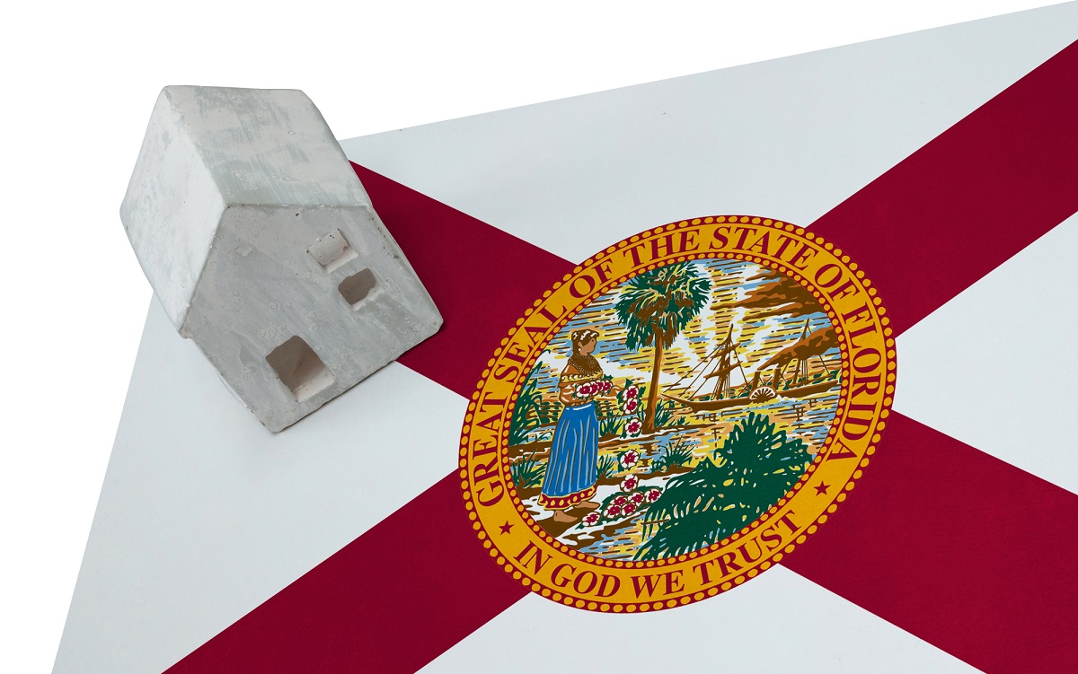 Home insurance - Florida Flag with house on it