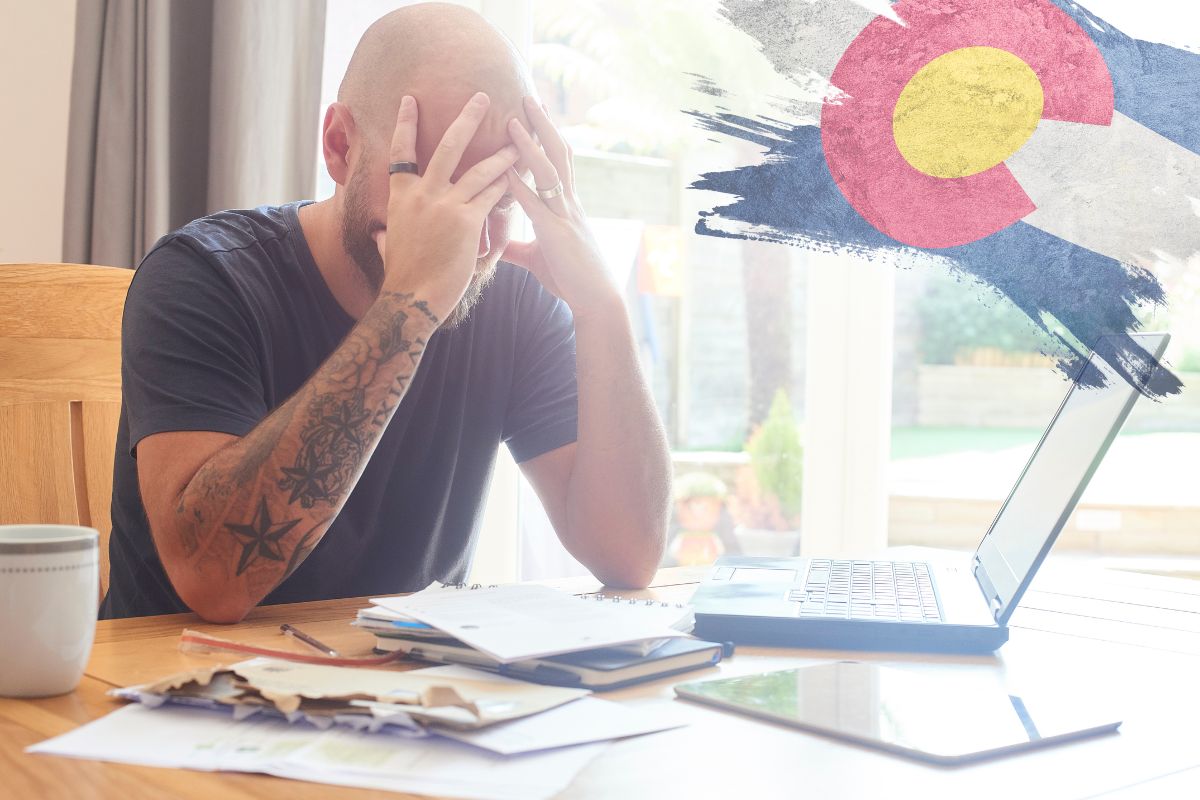 Home Insurance - Person Stressed - Colorado Flag