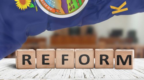 Workers Compensation - Kansas Flag - Reform